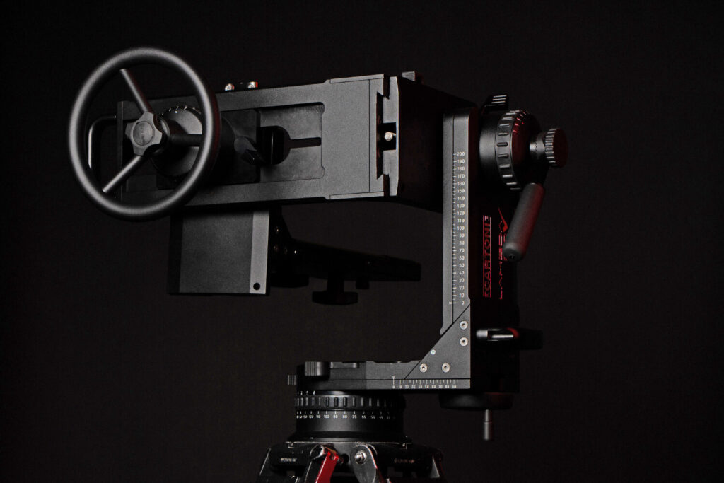 The Cartoni Lambda Nodal Swing Head is a precision-engineered fluid head designed for digital cinema cameras and 35mm film cameras equipped with long lenses, matte boxes, and large film magazines.