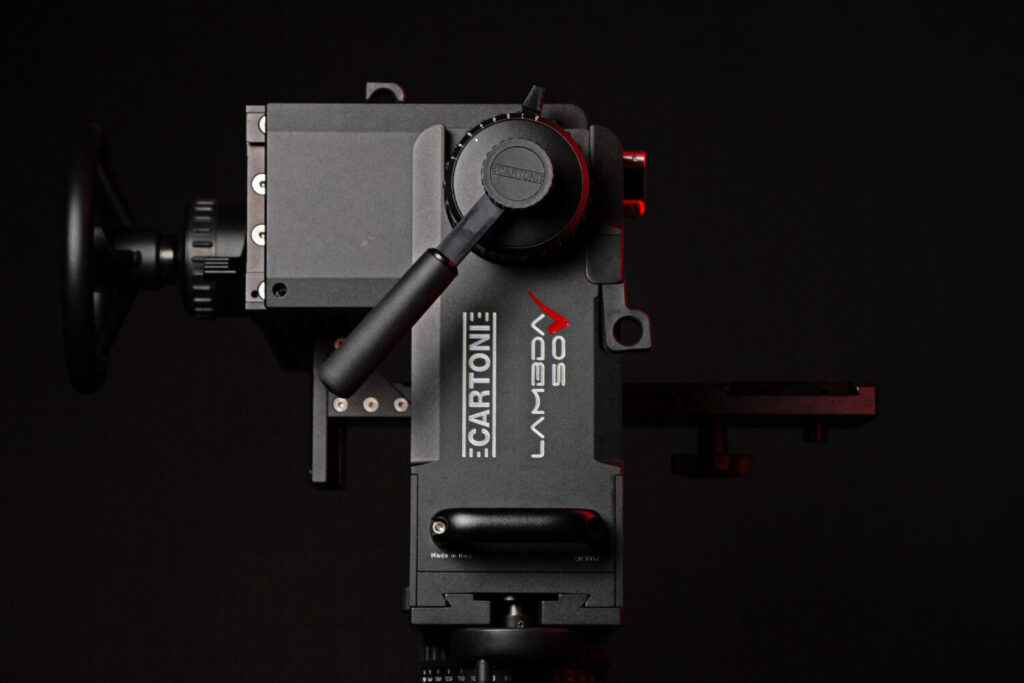 The Cartoni Lambda Nodal Swing Head is a precision-engineered fluid head designed for digital cinema cameras and 35mm film cameras equipped with long lenses, matte boxes, and large film magazines.